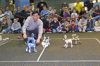 Dan with robot soccer dogs